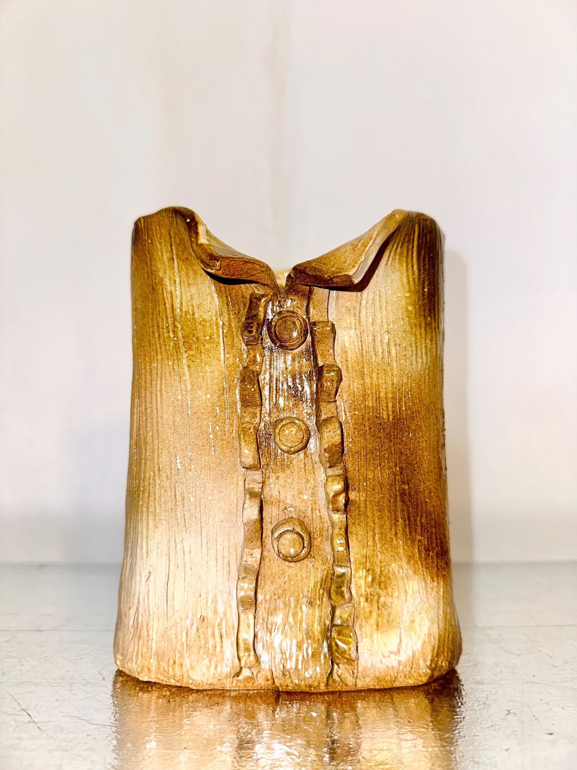 Glazed ceramic shirt vase