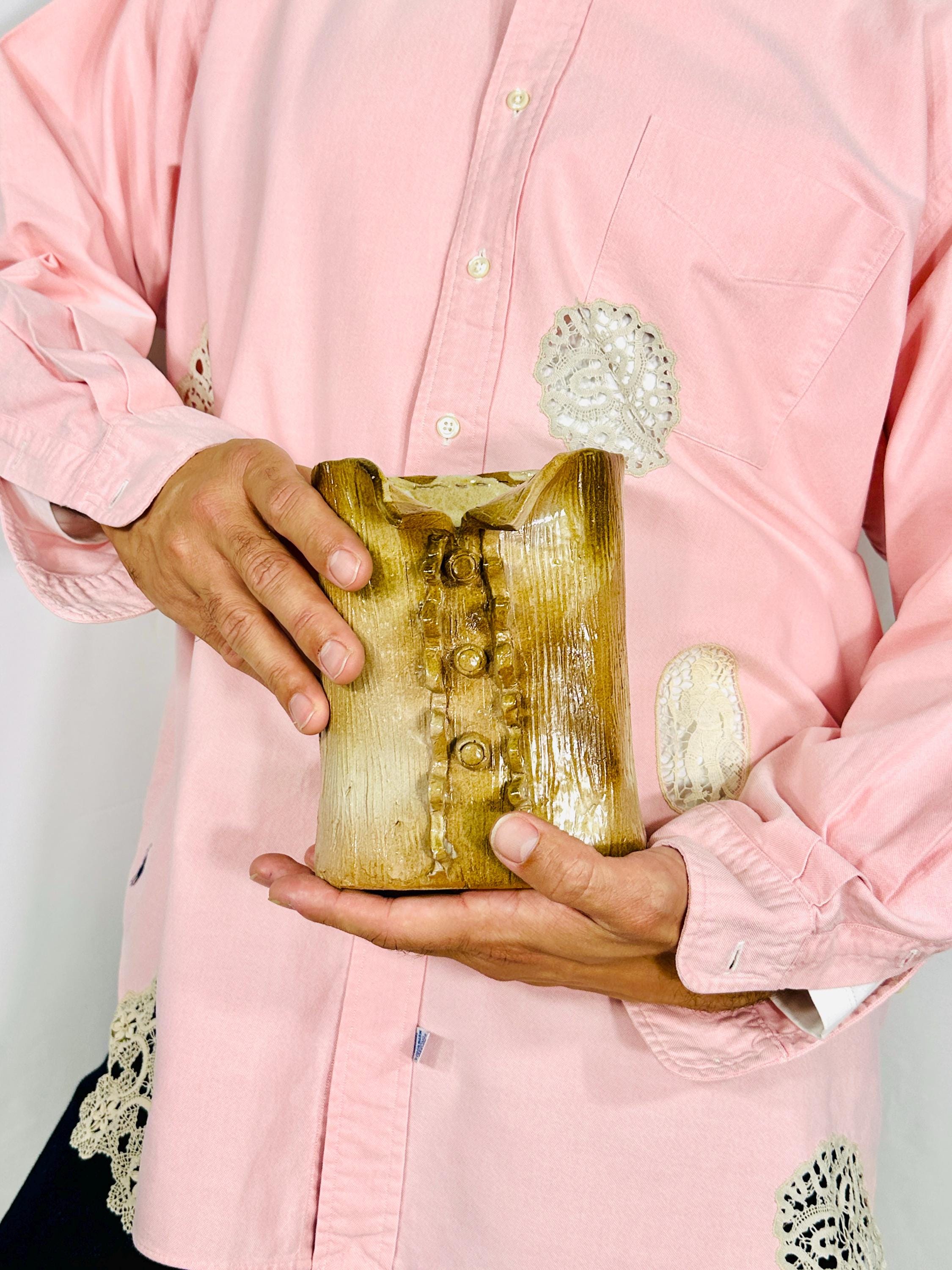 Glazed ceramic shirt vase